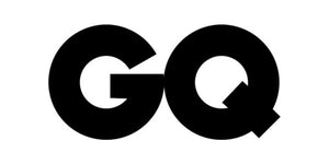 'GQ logo in bold black letters on a white background.'